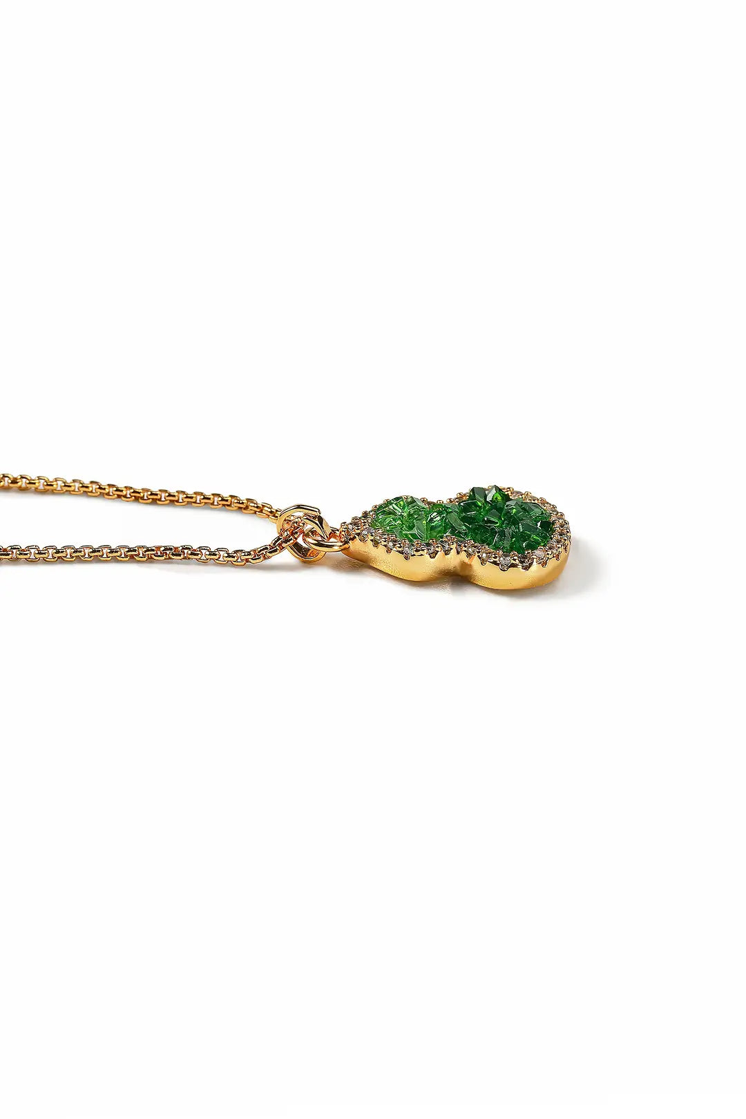 Aiko Tanaka Hisago necklace lying flat, a green gourd pendant on a fine gold chain, shown on a white background